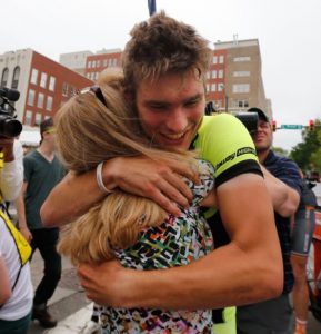 Chris Jones hugs his mom, Susan Mitchell, after winning the Collegiate Road Cycling Championships Time Trials on May 4.
