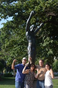 Spanish teacher Marina Andueza and family next to the Rocky Balboa statue placed in 1980.