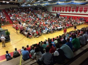 The Godwin gym fills up as students arrive to celebrate the life of their teacher, coach, and friend Todd Phillips