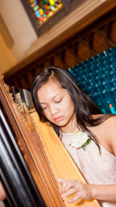 Photo credit: Phoung Dao Dao focuses as she plays her harp. 